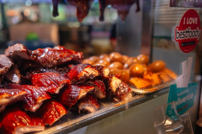 A Taste of Singapore: Hawker Center Private Customized Food Tour - Chinatown hawker center: spring rolls and dim sum as a team sport
