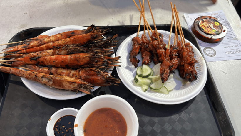 Signature Night Tour: Walk Through Marina with Food Tastings - Lau Pa Sat satay, sugar cane juice, and what to expect at the food stop