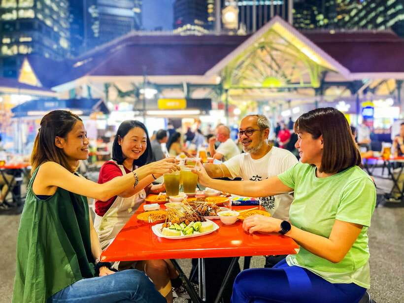 Singapore: Big Bus Night Tour by Open-Top Bus & Live Guide - Lau Pa Sat and satay sampling inside a heritage hawker hub