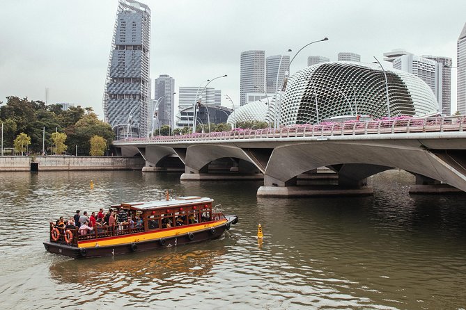 Singapore PRIVATE TOUR: Highlights & Hidden Gems by CAR or Foot - Raffles Arcade: a short, high-impact slice of the Raffles Hotel area